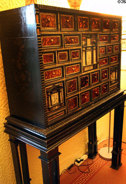Inlaid collection cabinet on stand at Brodie Castle. Brodie, Scotland.