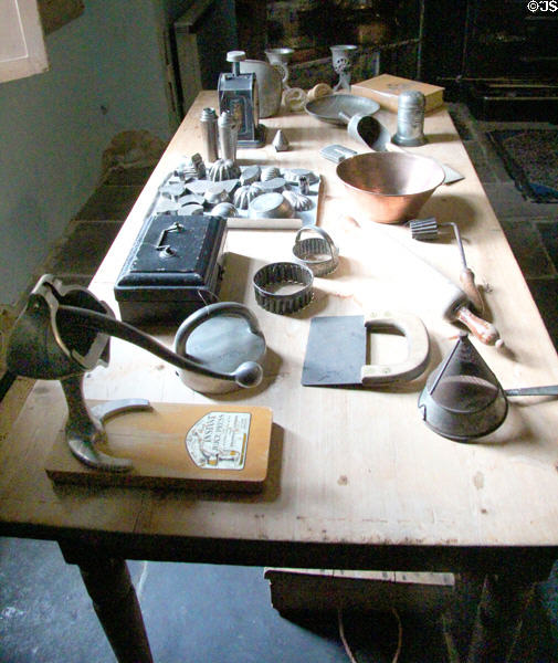 Kitchen utensils including juice press at Brodie Castle. Brodie, Scotland.