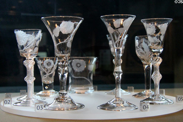 Wine glasses engraved with Jacobite rose emblems (from c1745) used for secret toasts to Stuart monarchs in exile at Culloden Moor Visitor Centre. Culloden Moor, Scotland.
