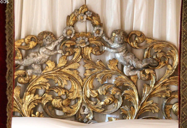Gilded headboard on four-poster bed (c1662) in tapestry bedroom at Cawdor Castle. Cawdor, Scotland.