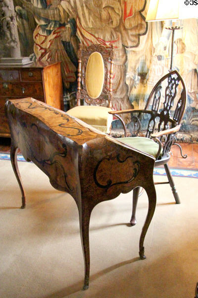 French Louis XV marquetry writing desk signed by Hache of Grenoble plus English Gothic Windsor chair (c1760) at Cawdor Castle. Cawdor, Scotland.