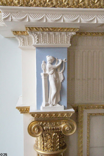 William Adam design of woman playing lyre on North drawing room fireplace at Duff House. Banff, Scotland.