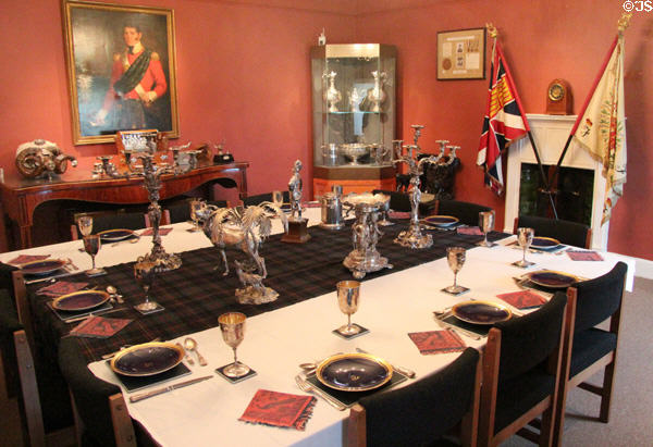 Regimental dining room with Scottish silver mementos presented by various officers at Fort George Highlanders' Museum. Fort George, Scotland.