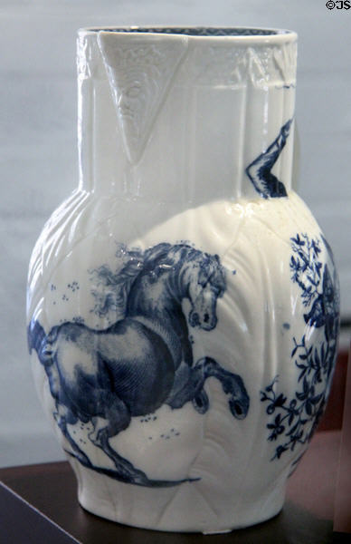 Caughley Porcelain large jug transfer printed with cobalt blue Italian rearing horse scene (c1780-85) based on print by Antonio Tempesta at Coalport China Museum. Ironbridge, England.