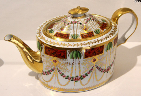 Oval teapot (c1800-5) with gilt, red, green palm tree decoration by unmarked of Coalport at Coalport China Museum. Ironbridge, England.