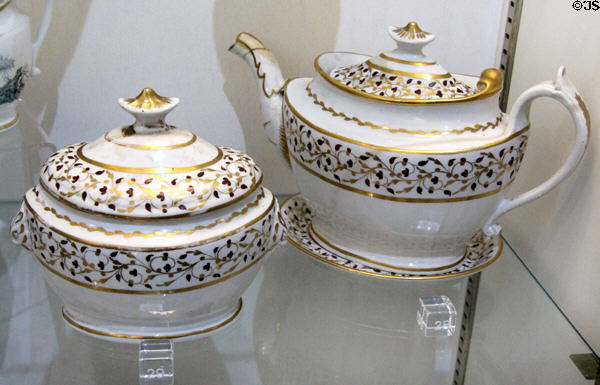 Teapot & stand plus covered sugar box (c1800-10) pattern 303 with gilt & vine decoration perhaps by Coalport at Coalport China Museum. Ironbridge, England.