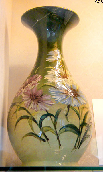 Flared neck vase painted with flowers (c1882-1905) by Salopian at Coalport China Museum. Ironbridge, England.