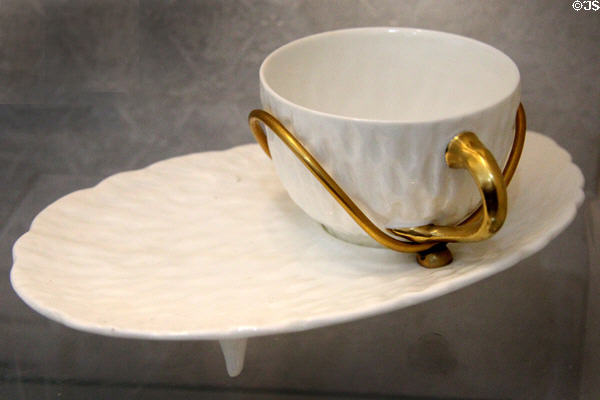 White cup & oval saucer in gilt handle (c1906) by crown Coalport at Coalport China Museum. Ironbridge, England.