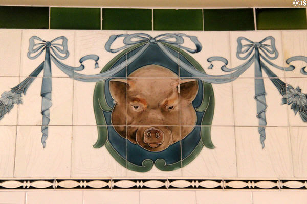 Butcher shop tile frieze of pigs` heads (early 20thC) by T&R Boote of Burslem, Stoke at Jackfield Tile Museum. Ironbridge, England.