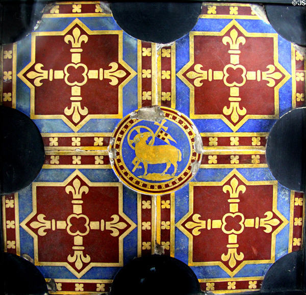 Victorian encaustic Gothic Revival church tiles showing lamb of God round inserts between crosses (c1850) by A.W.N. Pugin for Minton & Co at Jackfield Tile Museum. Ironbridge, England.