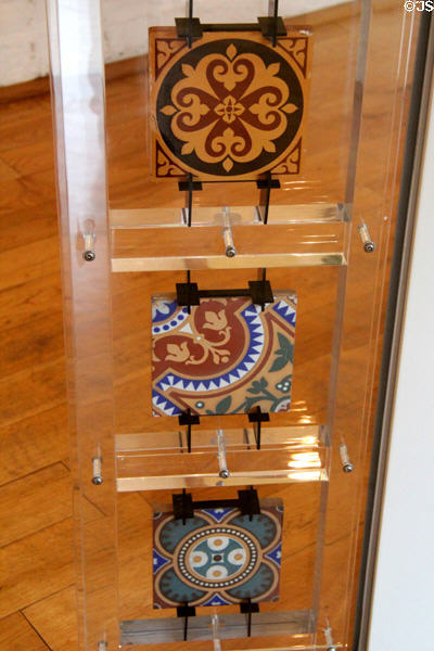 Dust pressed clay Gothic Revival tiles machine made by putting tons of pressure on slightly damp powdered clay meaning it dried faster & was cheaper to manufacture (patented 1840) at Jackfield Tile Museum. Ironbridge, England.