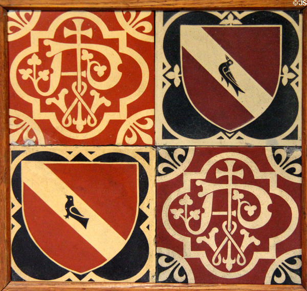 Encaustic tile panel with designer's initials AWNP between martlet birds (c1843) by A.W.N. Pugin made by Minton & Co at Jackfield Tile Museum. Ironbridge, England.