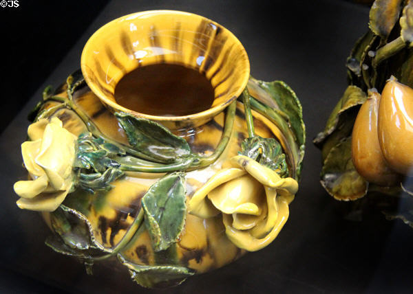 Ceramics vase with sculpted roses (1880s) by Benthall Pottery Co which became part of Salopian Art Pottery at Jackfield Tile Museum. Ironbridge, England.