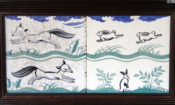 Foxes & rabbits chase series hand=painted tile panel (1930s) by Edward Bawden for Carter & Co at Jackfield Tile Museum. Ironbridge, England.