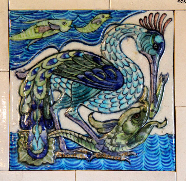 Peacock relief-moulded, hand-painted tile (1888-97) by William De Morgan at Jackfield Tile Museum. Ironbridge, England.