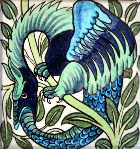 Uroboros winged snake swallowing its tale hand-painted tile (c1880-90s) by William De Morgan at Jackfield Tile Museum. Ironbridge, England.