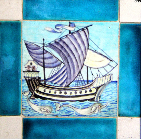 Sailing ship with dolphins hand-painted tile (1888-97) by William De Morgan at Jackfield Tile Museum. Ironbridge, England.