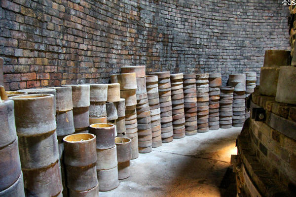 Saggars with pottery plates to be fired stacked in kiln at Gladstone Pottery Museum. Longton, Stoke, England.