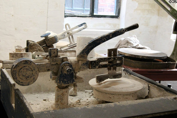 Machine for forming plates at Gladstone Pottery Museum. Longton, Stoke, England.