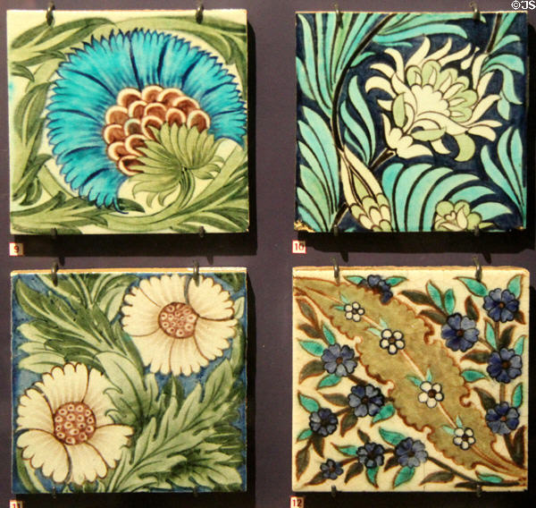 Four floral tiles (1888-97) by William De Morgan, Sands End at Gladstone Pottery Museum. Longton, Stoke, England.