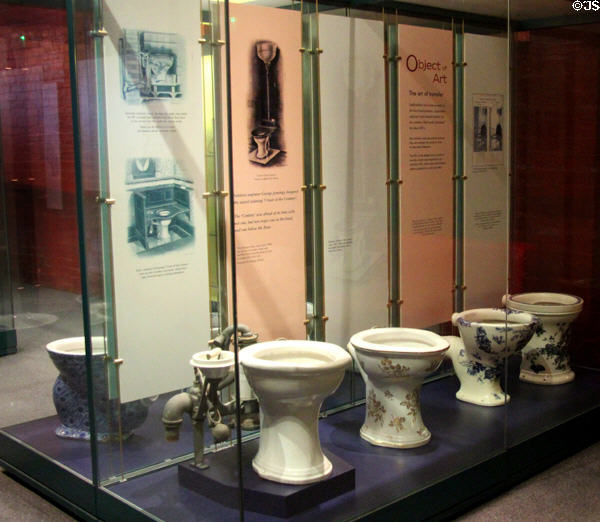 Ceramic flush water closet designs (1880 & after) by several Staffordshire potteries in bathroom history display at Gladstone Pottery Museum. Longton, Stoke, England.