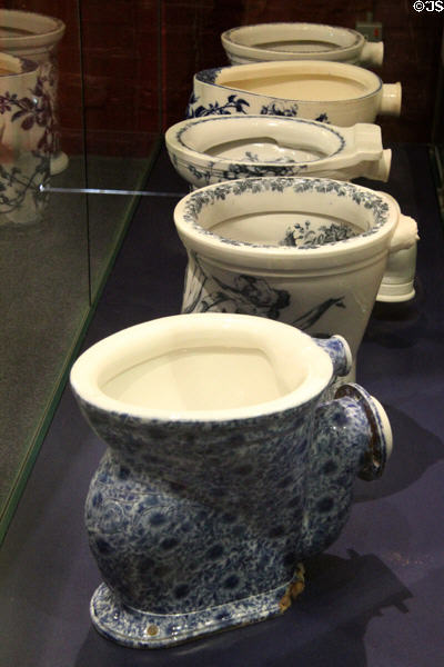 Ceramic flush water closet designs (1880 & after) by several Staffordshire potteries in bathroom history display at Gladstone Pottery Museum. Longton, Stoke, England.