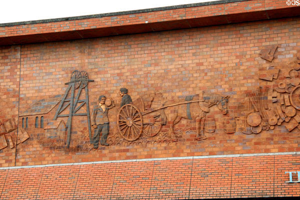 Mining industry history section of mural on Potteries Museum & Art Gallery. Hanley, Stoke-on-Trent, England.