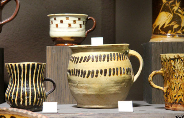 Slip decorated vessels (late 1600s-1760) from North Straffordshire at Potteries Museum & Art Gallery. Hanley, Stoke-on-Trent, England.