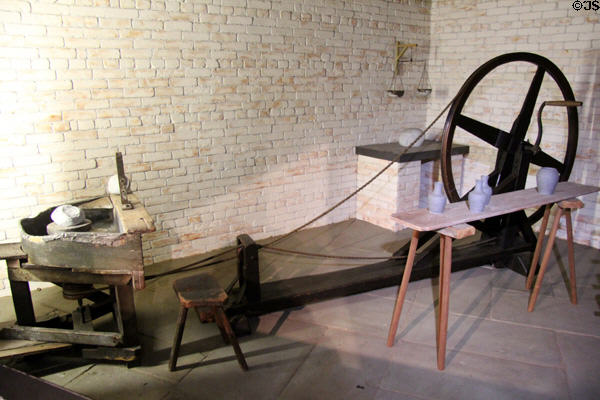 Replica of rope driven potters wheel as would have been used by Wedgwood's firm at Potteries Museum & Art Gallery. Hanley, Stoke-on-Trent, England.