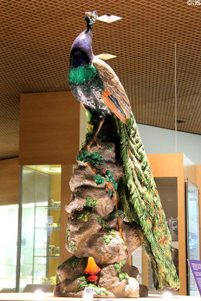 Earthenware life-size peacock shape 2045 (1875) by Paul Comoléra for Minton of Stoke-upon-Trent at Potteries Museum & Art Gallery. Hanley, Stoke-on-Trent, England.