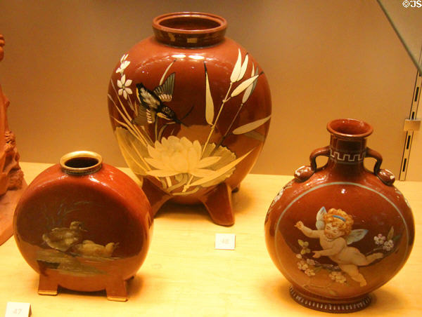 Painted ceramic flasks (1871-5) by Art Pottery Studio in London which offered middle class ladies an artistic career as part of Mintons of Stoke-upon-Trent at Potteries Museum & Art Gallery. Hanley, Stoke-on-Trent, England.