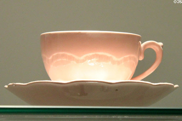 Pink Earthenware cup & saucer (c1930) by J&G Meakin of Hanley, Staffordshire at Potteries Museum & Art Gallery. Hanley, Stoke-on-Trent, England.