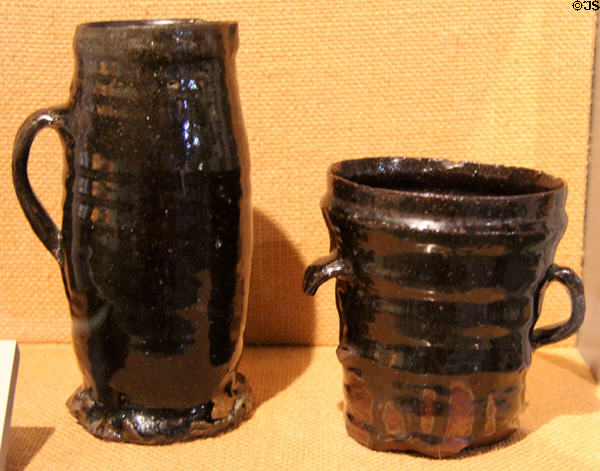 Red clay Tygs (c1580) from North of England at Potteries Museum & Art Gallery. Hanley, Stoke-on-Trent, England.
