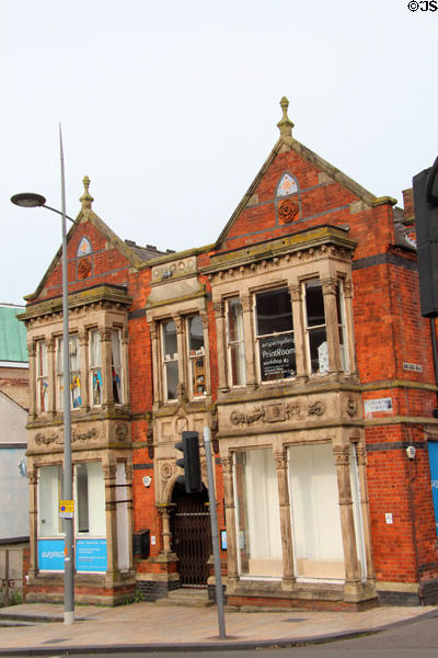 Brick Victorian building decorated with carved stones & tiles (now a gallery) at Broad Street & Bird Cage Walk. Hanley, Stoke-on-Trent, England.