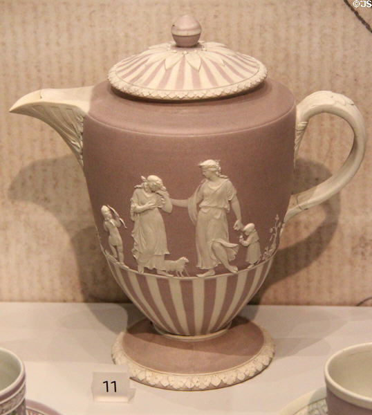 Wedgwood lilac jasper coffee pot depicting Friendship consoling Affliction (1780-5) by William Hackwood after design by Lady Templetown at World of Wedgwood. Barlaston, Stoke, England.