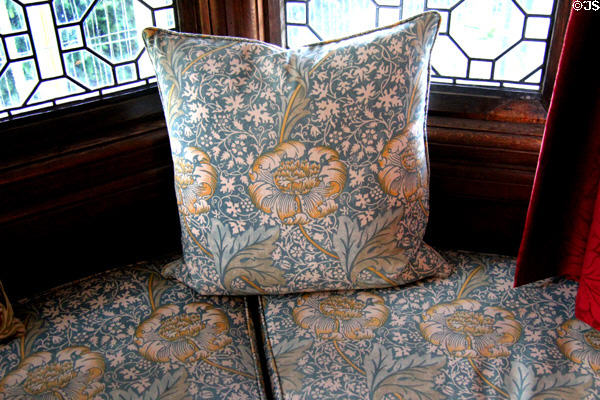 Bench cushions in style of Morris & Co in drawing room at Wightwick Manor. Wolverhampton, England.