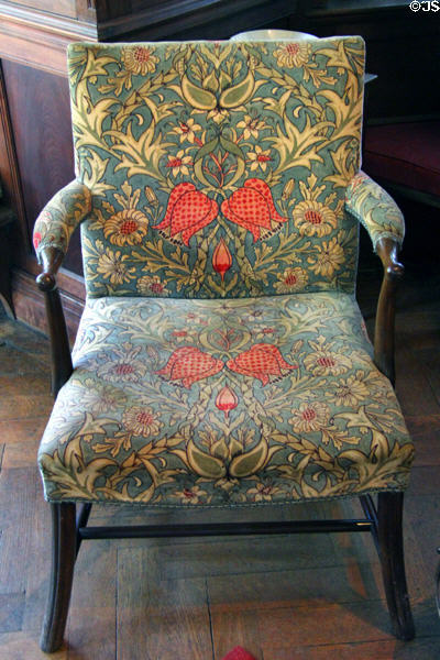 Fritillary printed cotton (c1890) by Sidney Mawson for Wardle of Leek Co recovering Elbow chair by Morris & Co at Wightwick Manor. Wolverhampton, England.