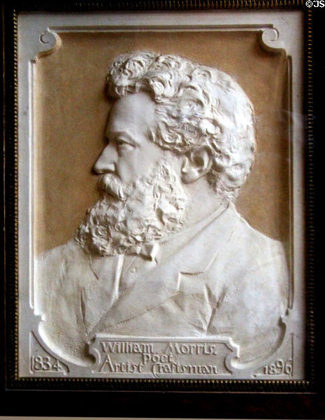 William Morris (1834-96) Poet, Artist, Craftsman relief profile portrait (post 1896) at Wightwick Manor. Wolverhampton, England.