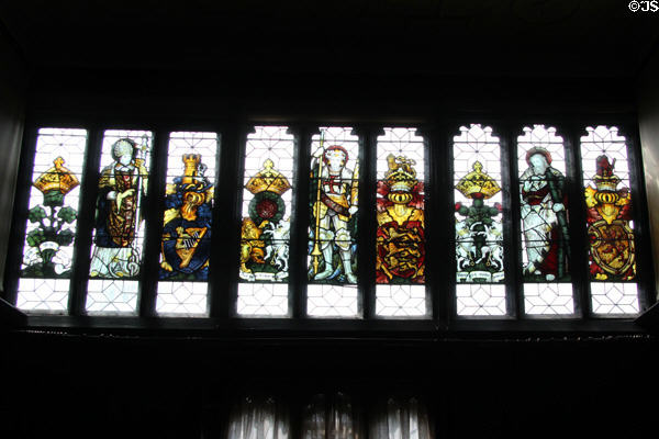 Series of symbol of Ireland, England, Scotland stained glass windows (1893) by studio of Charles Eamer Kempe in Great Parlor at Wightwick Manor. Wolverhampton, England.