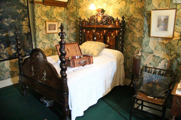 Acanthus wallpaper bedroom with spiral posted bed at Wightwick Manor. Wolverhampton, England.