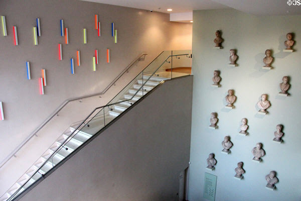 Modern staircase with collection of historic busts (early 19thC) by Sir Francis Chantrey at Ashmolean Museum. Oxford, England.