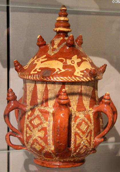 Earthenware posset pot (1687) from Staffordshire, England at Ashmolean Museum. Oxford, England.