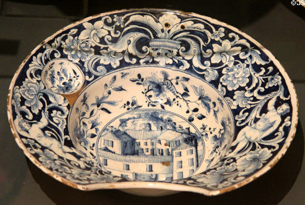 Barber's bowl painted with country scene (c1740-50) from Bristol? at Ashmolean Museum. Oxford, England.