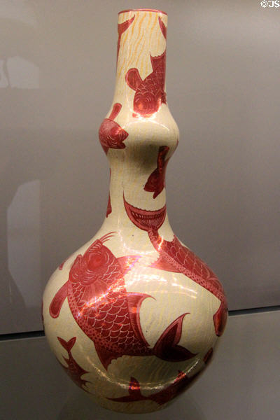 Ruby lustre fish bottle (1888-1897) by Charles Passenger for William De Morgan at Ashmolean Museum. Oxford, England.