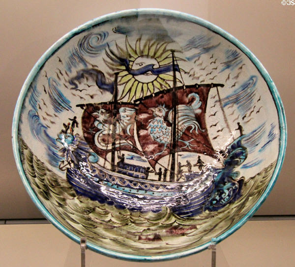 Lustre galleon plate (1888-1897) by William De Morgan & decorated by Halsey Ricardo of Sands End Pottery of Fulham at Ashmolean Museum. Oxford, England.