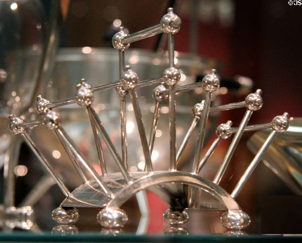 Electroplated nickel silver toast rack (1881) by Christopher Dresser made by Hukin & Heath of Birmingham at Ashmolean Museum. Oxford, England.