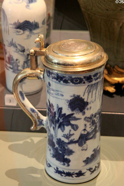 Porcelain tankard from China with underglaze blue topped with European silver mounts (1645-65) at Ashmolean Museum. Oxford, England.