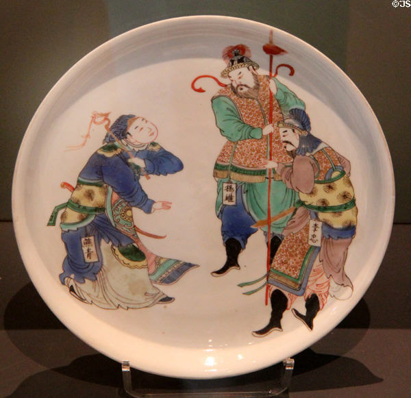 Porcelain dish painted overglaze with Chinese figures (late 1600s) made in China at Ashmolean Museum. Oxford, England.