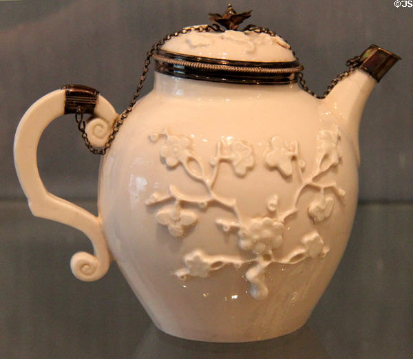 Porcelain blanc de Chine teapot with silver mounts (1740) by Saint-Cloud of France at Ashmolean Museum. Oxford, England.