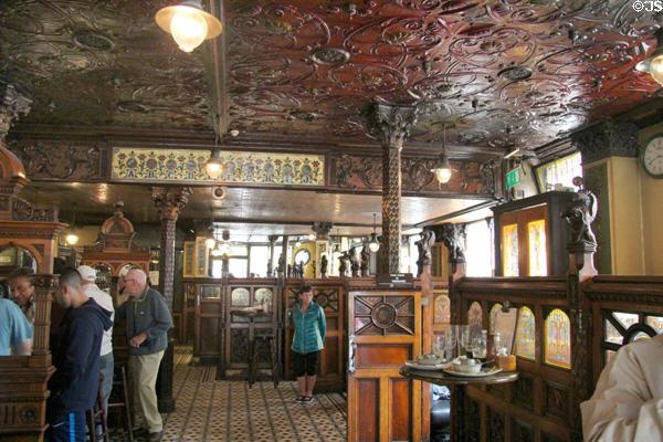 Interior of with snugs for privacy at right Crown Liquor Saloon. Belfast, Northern Ireland.